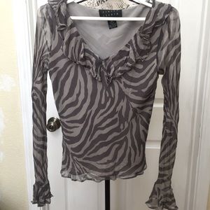 Animal print silk ruffle blouse